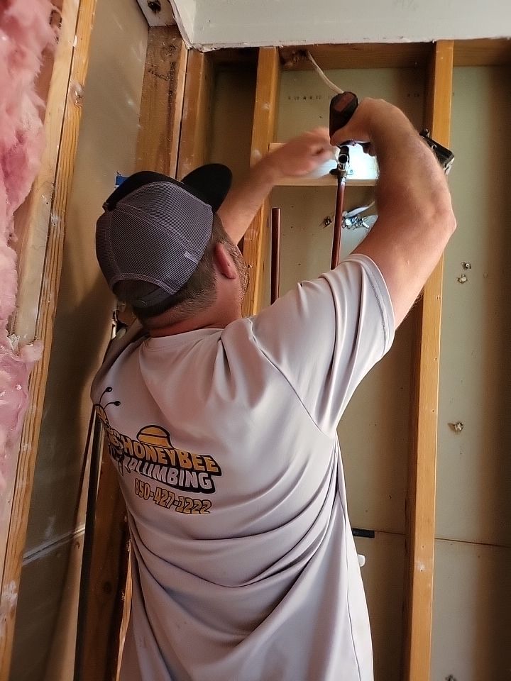 Honey Bee Plumbing technician completing a residential repipe